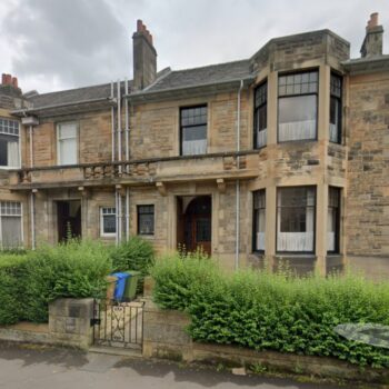 Photograph of a sandstone villa